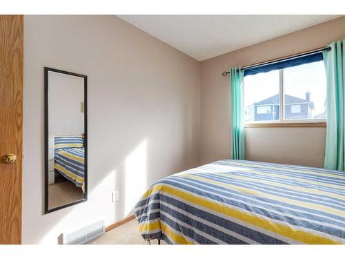 67 Somercrest Close Sw, Calgary, AB - Indoor Photo Showing Bedroom