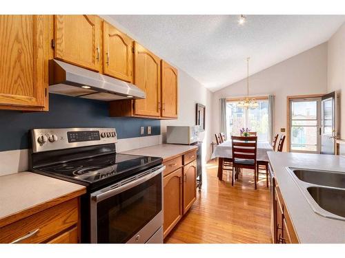 67 Somercrest Close Sw, Calgary, AB - Indoor Photo Showing Kitchen With Double Sink