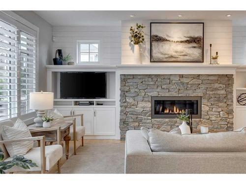 163 Auburn Sound Manor Se, Calgary, AB - Indoor Photo Showing Living Room With Fireplace