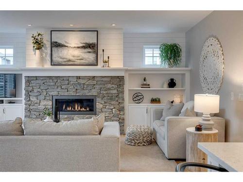 163 Auburn Sound Manor Se, Calgary, AB - Indoor Photo Showing Living Room With Fireplace