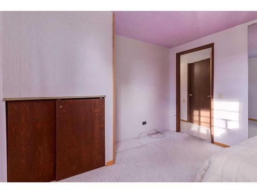 56 Huntwick Way Ne, Calgary, AB - Indoor Photo Showing Bedroom