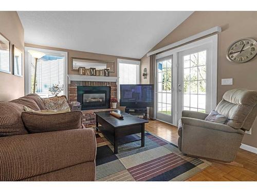 124 Midpark Drive Se, Calgary, AB - Indoor Photo Showing Living Room With Fireplace