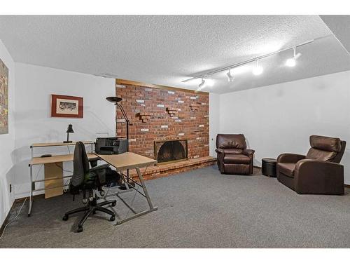 124 Midpark Drive Se, Calgary, AB - Indoor With Fireplace