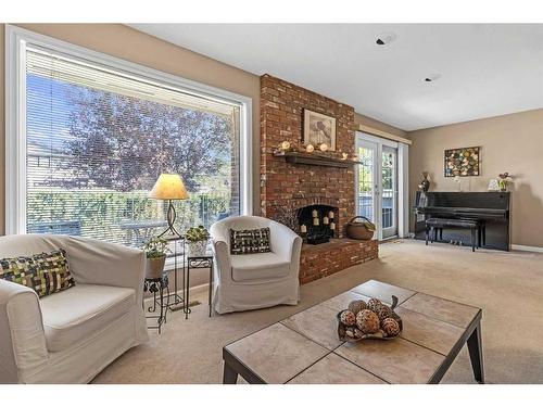 124 Midpark Drive Se, Calgary, AB - Indoor Photo Showing Living Room With Fireplace