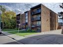 210-515 57 Avenue Sw, Calgary, AB  - Outdoor With Balcony With Facade 