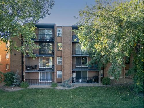 210-515 57 Avenue Sw, Calgary, AB - Outdoor With Balcony With Facade