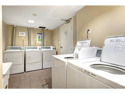 210-515 57 Avenue Sw, Calgary, AB - Indoor Photo Showing Laundry Room