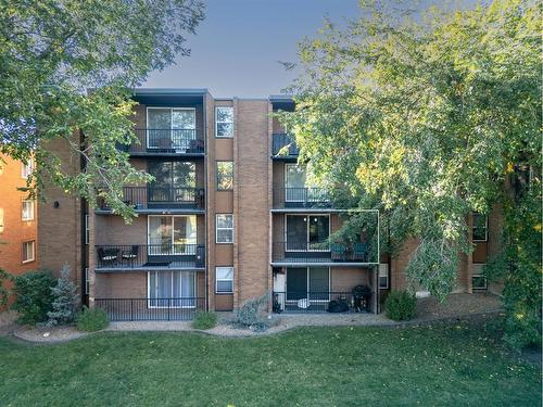 210-515 57 Avenue Sw, Calgary, AB - Outdoor With Balcony With Facade