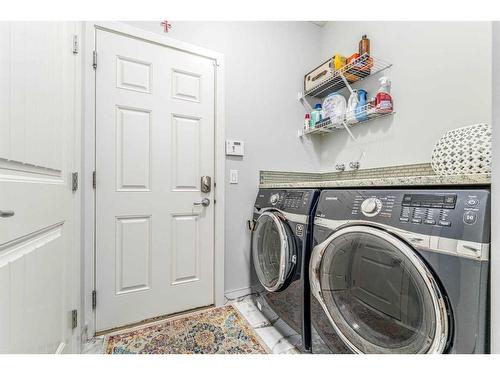 11 Aspen Hills Close Sw, Calgary, AB - Indoor Photo Showing Laundry Room