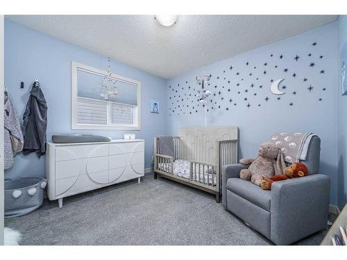 11 Aspen Hills Close Sw, Calgary, AB - Indoor Photo Showing Bedroom