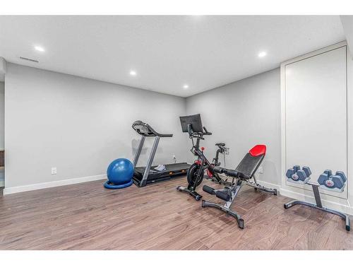 11 Aspen Hills Close Sw, Calgary, AB - Indoor Photo Showing Gym Room