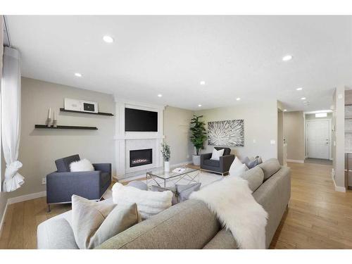 252 Sierra Madre Court Sw, Calgary, AB - Indoor Photo Showing Living Room With Fireplace