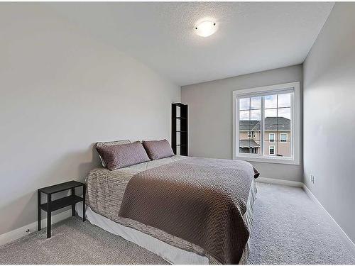 116 Cranarch Crescent Se, Calgary, AB - Indoor Photo Showing Bedroom