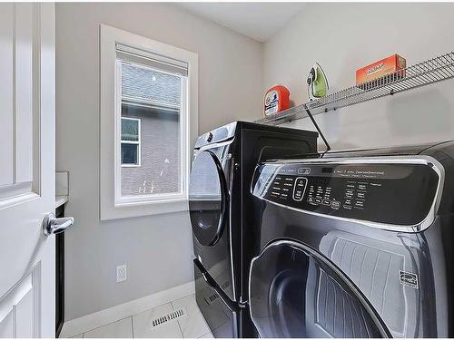 116 Cranarch Crescent Se, Calgary, AB - Indoor Photo Showing Laundry Room