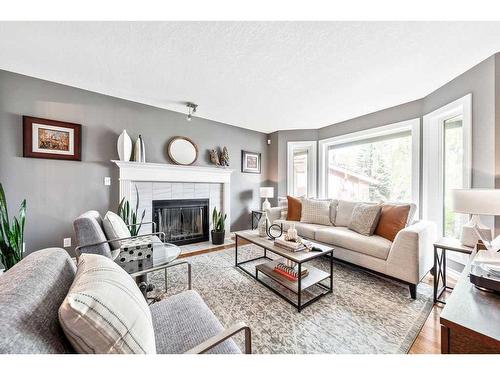 412 Christie Knoll Point Sw, Calgary, AB - Indoor Photo Showing Living Room With Fireplace