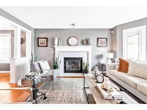 412 Christie Knoll Point Sw, Calgary, AB - Indoor Photo Showing Living Room With Fireplace