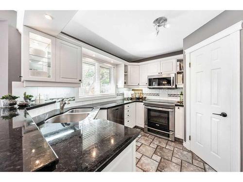 412 Christie Knoll Point Sw, Calgary, AB - Indoor Photo Showing Kitchen With Stainless Steel Kitchen With Double Sink