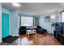 119 Erin Road Se, Calgary, AB  - Indoor Photo Showing Living Room 