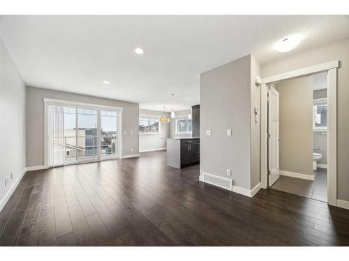 907 Evanston Manor Nw, Calgary, AB - Indoor Photo Showing Living Room