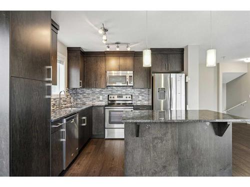 907 Evanston Manor Nw, Calgary, AB - Indoor Photo Showing Kitchen With Stainless Steel Kitchen With Upgraded Kitchen