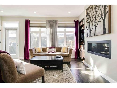 1431B 39 Street Sw, Calgary, AB - Indoor Photo Showing Living Room With Fireplace