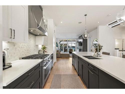 1922 46 Avenue Sw, Calgary, AB - Indoor Photo Showing Kitchen With Double Sink With Upgraded Kitchen