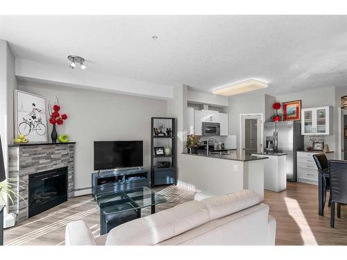 2345-151 Country Village Road Ne, Calgary, AB - Indoor Photo Showing Living Room With Fireplace