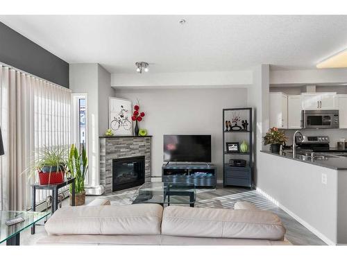 2345-151 Country Village Road Ne, Calgary, AB - Indoor With Fireplace