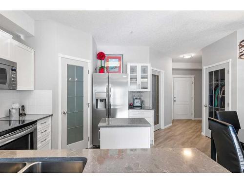 2345-151 Country Village Road Ne, Calgary, AB - Indoor Photo Showing Kitchen With Double Sink With Upgraded Kitchen