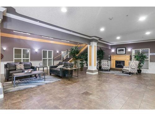 2345-151 Country Village Road Ne, Calgary, AB - Indoor With Fireplace