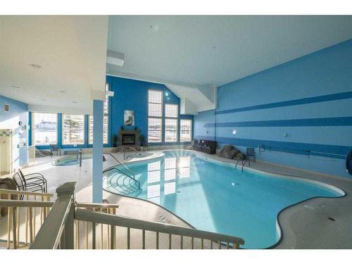 2345-151 Country Village Road Ne, Calgary, AB - Indoor Photo Showing Other Room With In Ground Pool