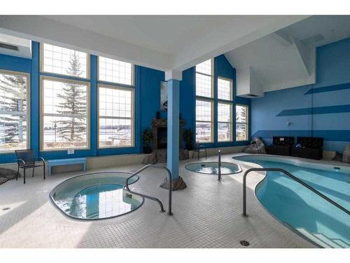 2345-151 Country Village Road Ne, Calgary, AB - Indoor Photo Showing Other Room With In Ground Pool