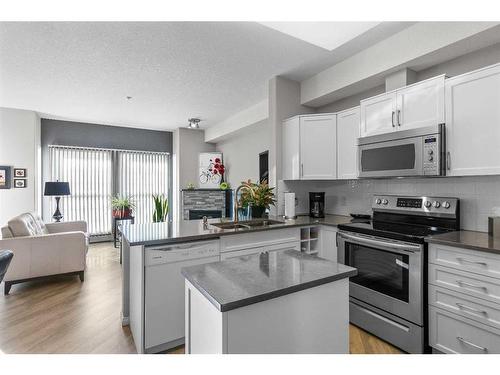 2345-151 Country Village Road Ne, Calgary, AB - Indoor Photo Showing Kitchen With Stainless Steel Kitchen