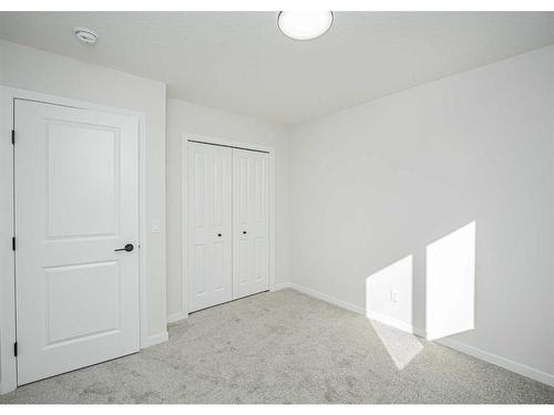 954 Bayview Rise Sw, Airdrie, AB - Indoor Photo Showing Other Room