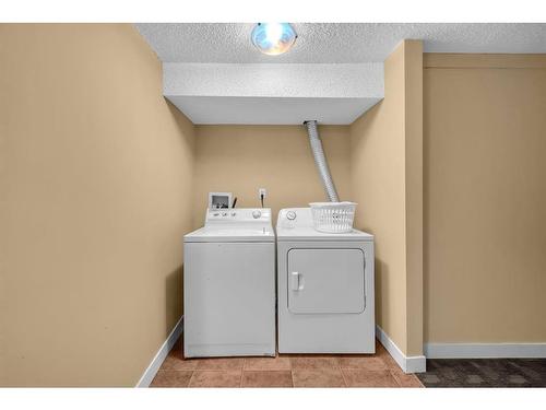 63 Whitnel Close Ne, Calgary, AB - Indoor Photo Showing Laundry Room