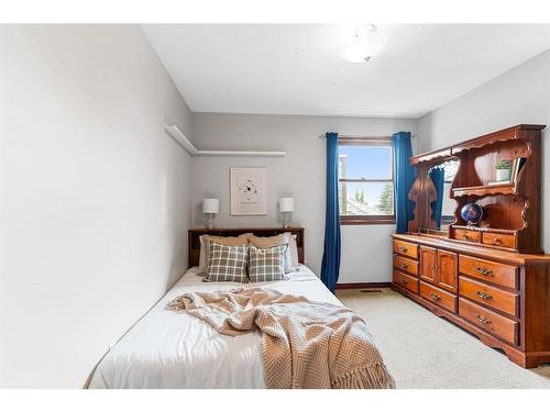 10 Tipping Close Se, Airdrie, AB - Indoor Photo Showing Bedroom