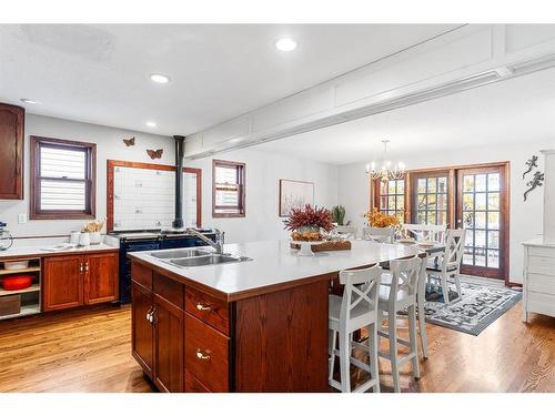 10 Tipping Close Se, Airdrie, AB - Indoor Photo Showing Kitchen With Double Sink