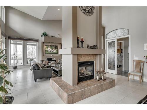 16159 265 Avenue West, Rural Foothills County, AB - Indoor Photo Showing Living Room With Fireplace