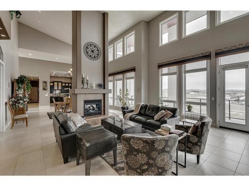 16159 265 Avenue West, Rural Foothills County, AB - Indoor Photo Showing Living Room With Fireplace