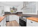 260 2 Avenue, Drumheller, AB  - Indoor Photo Showing Kitchen With Stainless Steel Kitchen With Double Sink 