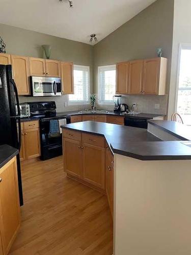 59 Royal Birch Street Nw, Calgary, AB - Indoor Photo Showing Kitchen With Double Sink