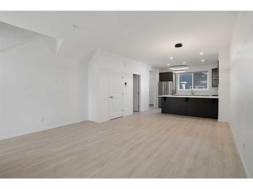 15 Heirloom Boulevard Se, Calgary, AB - Indoor Photo Showing Other Room