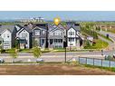 15 Heirloom Boulevard Se, Calgary, AB  - Outdoor With Facade 