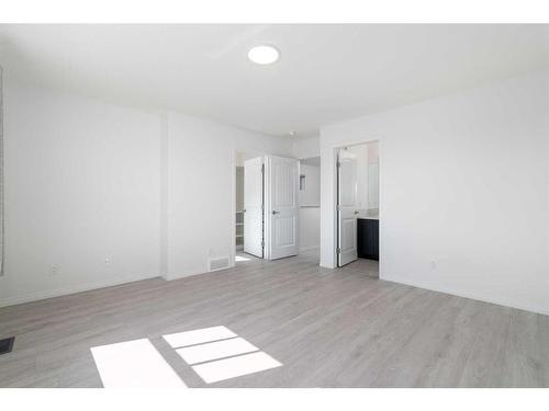 15 Heirloom Boulevard Se, Calgary, AB - Indoor Photo Showing Other Room