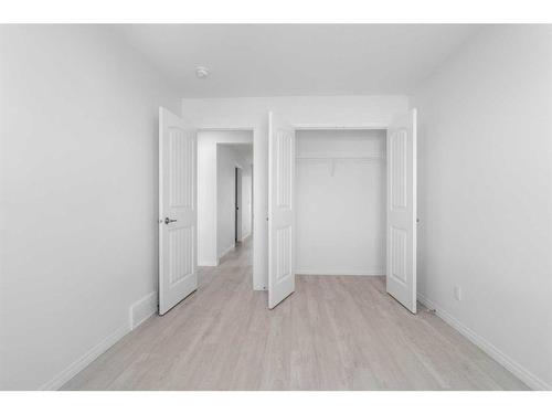 15 Heirloom Boulevard Se, Calgary, AB - Indoor Photo Showing Other Room