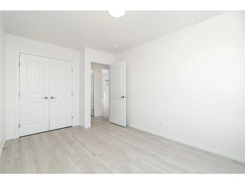 15 Heirloom Boulevard Se, Calgary, AB - Indoor Photo Showing Other Room