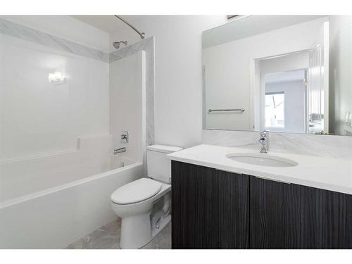 15 Heirloom Boulevard Se, Calgary, AB - Indoor Photo Showing Bathroom