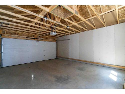 15 Heirloom Boulevard Se, Calgary, AB - Indoor Photo Showing Garage