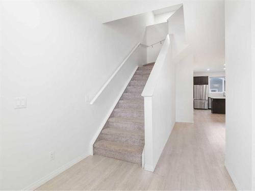 15 Heirloom Boulevard Se, Calgary, AB - Indoor Photo Showing Other Room