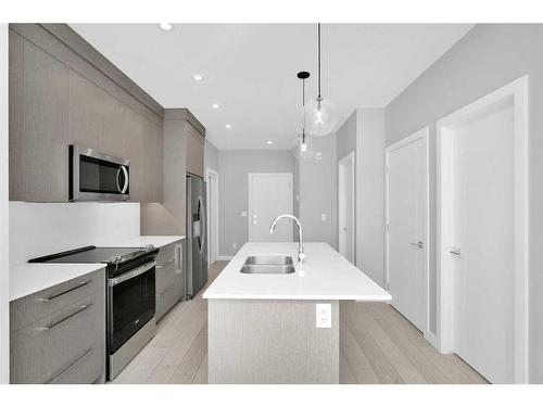 2117-395 Skyview Parkway Ne, Calgary, AB - Indoor Photo Showing Kitchen With Stainless Steel Kitchen With Double Sink With Upgraded Kitchen